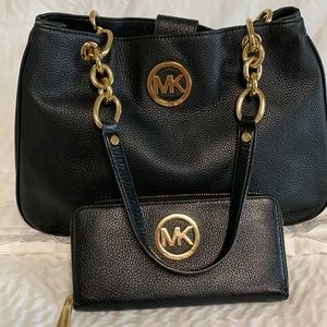 Michael Kors black pebble leather shoulder bag and wallet.